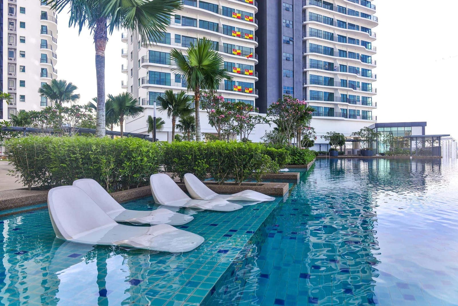 Datum Jelatek: loungers in the pool